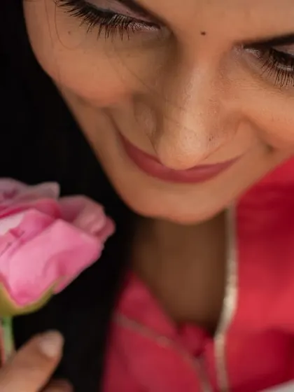 A delicate close-up focusing on a simple, beautiful detail. This artistic shot highlights a moment of quiet appreciation.