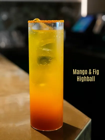 The Mango & Fig Highball, a vibrant and tropical drink perfect for any occasion.