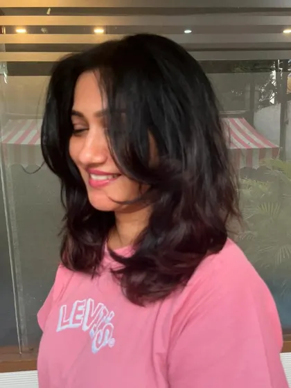 The new cut is a healthy and stylish medium-length look.