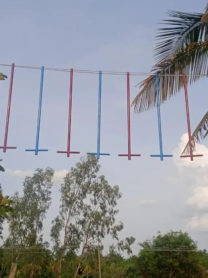 This simple yet effective hanging pole bridge is great for teams to cheer each other on. It's part of our comprehensive adventure setup for corporate day outings.