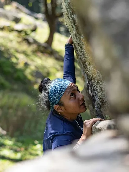 A duplicate of 80, this shot highlights the quiet focus and connection with nature that is a huge part of the outdoor climbing experience.