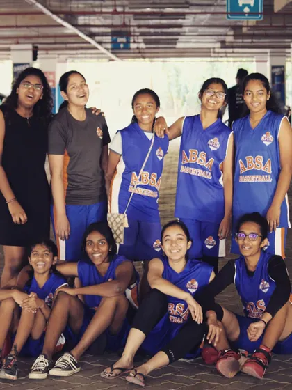 The girls team, all smiles after a good session. The bonds formed here go beyond the court, creating a true sense of teamwork and friendship.