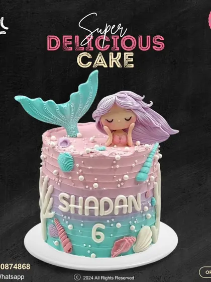 A magical mermaid cake personalized for a 6th birthday. This design features beautiful pastel ombre frosting, a detailed mermaid topper, and delicate seashell and coral decorations.