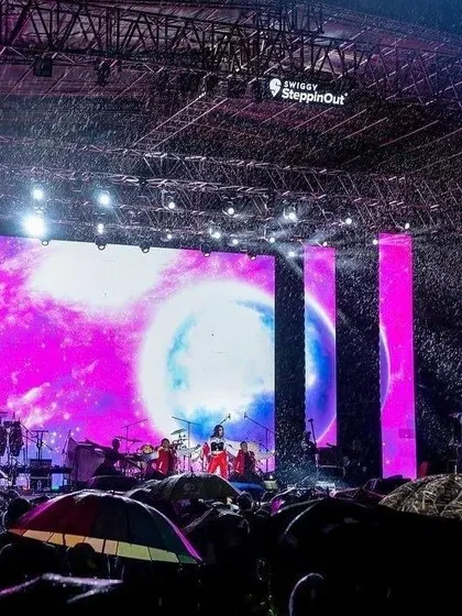 Even the rain couldn't stop the vibe at the Steppinout Music Festival. A sea of umbrellas and pure dedication from the fans.