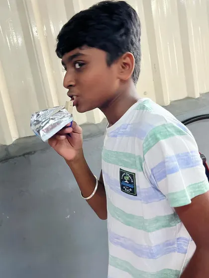 Enjoying a well-deserved treat. After working hard, it's important to enjoy the sweet moments too.