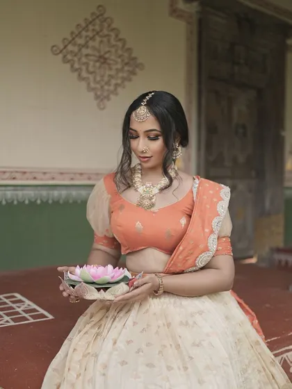 Another shot from our "Embrace Tradition" series. The makeup is kept elegant and understated to let the beautiful jewellery and outfit shine.
