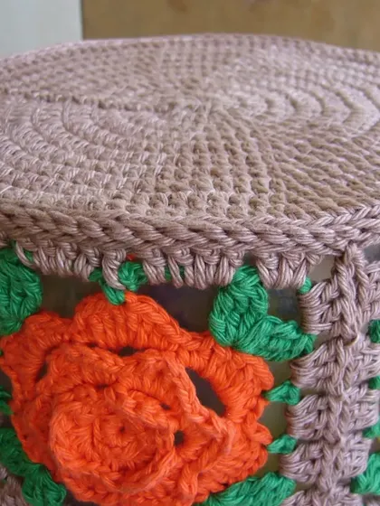 This view shows the top edge and base of my rose granny square basket. The sturdy construction ensures the basket holds its shape.