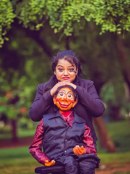 A fun, playful shot with Dinku in a park. He's the character that allows me to be my most mischievous self on stage.