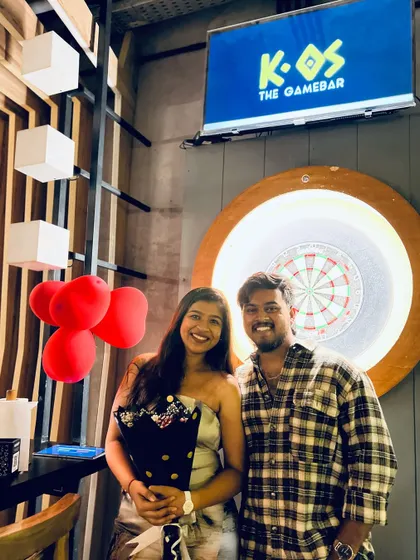 Another happy couple enjoying the month of love at K-OS. A bouquet of flowers and a game of darts makes for a perfect evening.