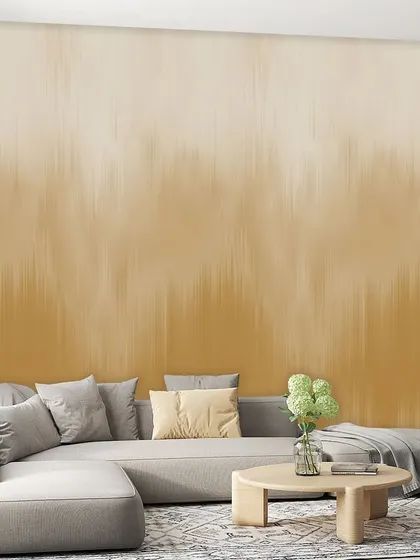 This sandy beige ombre wallcovering features a dripping paint effect, adding a unique artistic texture to the wall. It provides a sophisticated and contemporary backdrop.