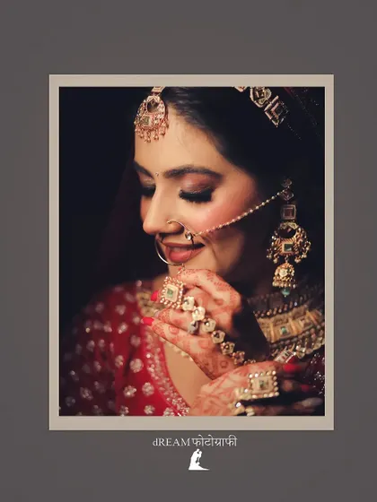 A close-up shot of bride Nikita, highlighting the intricate details of her rings and earrings.
