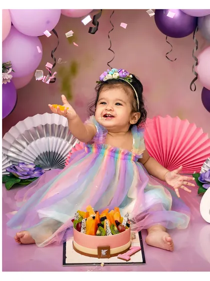 A rainbow dress for a day full of color and joy. My first birthday cake smash sessions are all about celebrating this huge milestone with lots of messy fun.