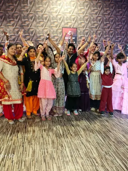 A happy group photo after a successful and energetic dance workshop. Everyone learned something new and had a great time.