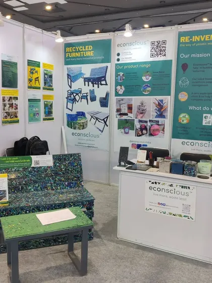 Another view of our exhibition setup, where visitors could see and touch the recycled plastic furniture. We believe in letting the quality and story of our products speak for themselves.