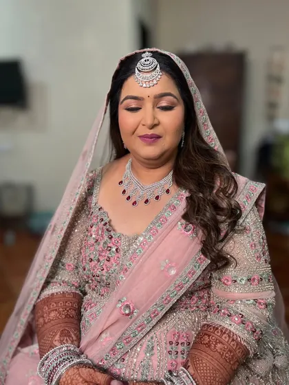 A close-up with eyes closed, highlighting the beautiful, blended eyeshadow.