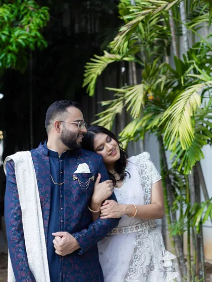 A sweet moment from a pre-wedding shoot. The soft, natural glam ensures the focus remains on the couple's happiness and connection.