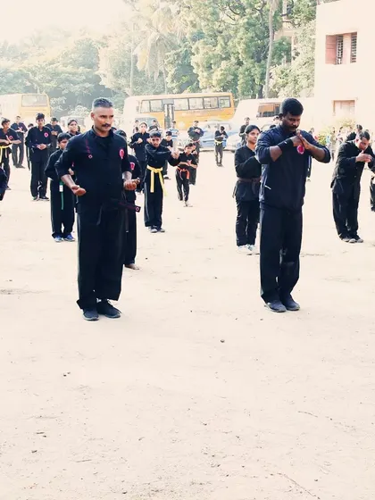 A moment of preparation between drills. Even in rest, our students maintain their posture and focus, showing that discipline is a constant state of mind.