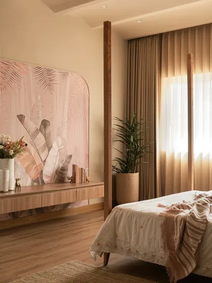This bedroom corner showcases a floating console set against a curved wallpaper feature wall. The design feels light and effortless, with east-facing windows that fill the space with a golden morning glow.