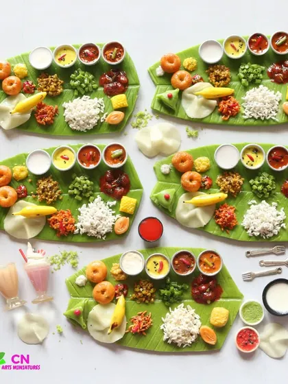 A beautiful set of Andhra-style meal miniatures, showcasing the vibrant colors and diverse dishes of the region.