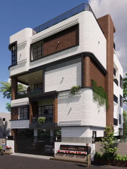 A corner view of the Art Deco-inspired villa, showing the interplay of curved and straight lines. The 40x60 south-facing home is designed for multi-generational living, with a duplex and two rental units.
