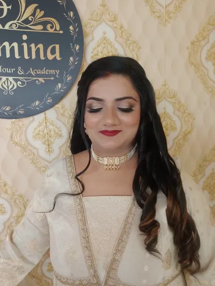 A close-up of the party makeup look, showing the blended eyeshadow and flawless base.