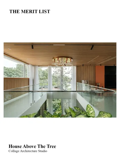 A view from the upper level of the 'House Above The Tree', which was longlisted for The Merit List. The design emphasizes openness and a connection to the outdoors, with large windows overlooking the surrounding greenery.