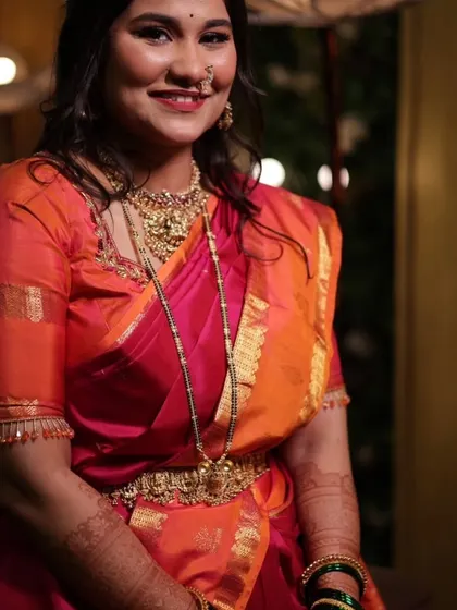A beautiful bride in a traditional silk saree, her hands adorned with my henna. The dark stain looks perfect with her outfit.
