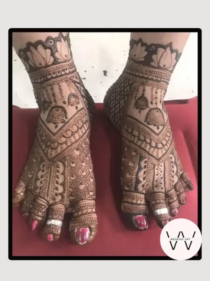 A detailed feet design featuring jhumka (earring) motifs, perfect for any festival.