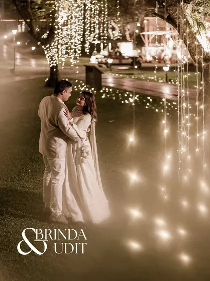 A fairytale moment under a canopy of lights. I specialize in transforming outdoor spaces into magical settings, like this boho-themed sangeet in Goa, where the couple is enveloped in a warm, dreamy glow.