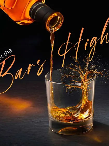 We set the bars high. This creative image, where a pour of whiskey forms a tree, symbolizes our commitment to crafting experiences, not just drinks.