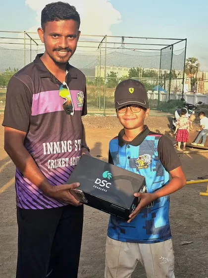 Our player proudly accepts the 'Best Bowler' of the tournament award for his skillful and impactful bowling spells.