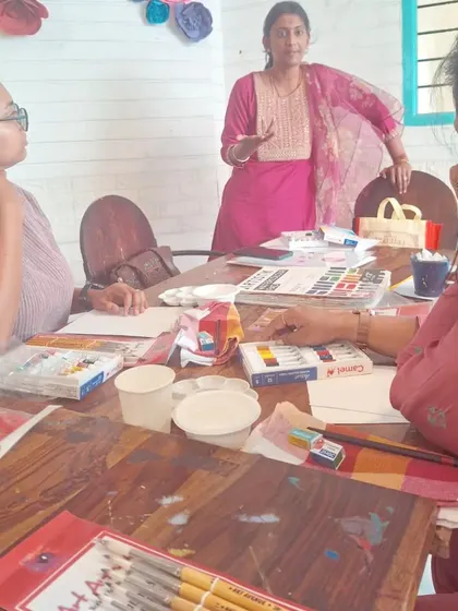 A group discussion during our art workshop, fostering a sense of community and shared learning.