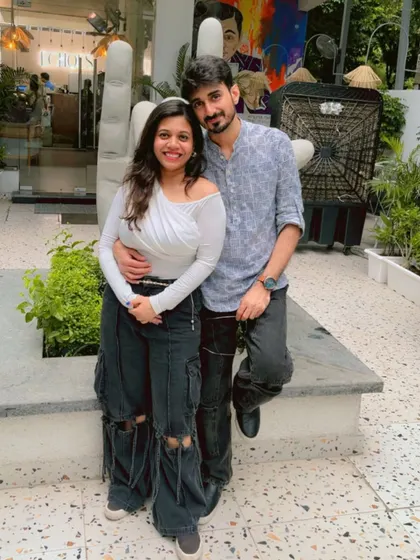 Posing together during a cafe visit. We love finding cool spots and just chilling together.