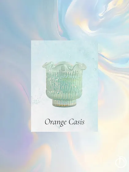 My Orange Casis fragrance, in a beautiful aqua-colored Zen Lotus votive, is designed to set a lively and calm rhythm for your day, perfect for your morning self-care rituals.