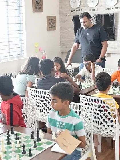 A glimpse into our Jayanagar academy, where one of our expert coaches provides personalized guidance during a group session. We maintain small class sizes to ensure every child gets the attention they need to thrive.