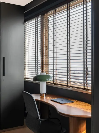 The media room in Apartment 1600, designed as a cozy and intimate space for watching movies.