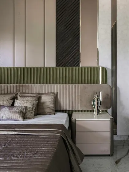 A beautifully appointed bedroom showcasing our signature style of quiet luxury. This space combines layered textures, a soothing color palette, and bespoke furniture to create a personal sanctuary for rest and relaxation.
