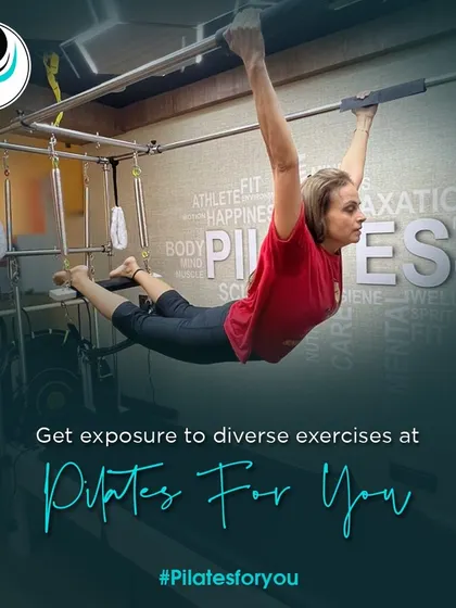 The Trapeze Tower opens up a world of diverse and challenging exercises. This hanging pose requires immense core control and upper body strength, showcasing an advanced level of Pilates practice.