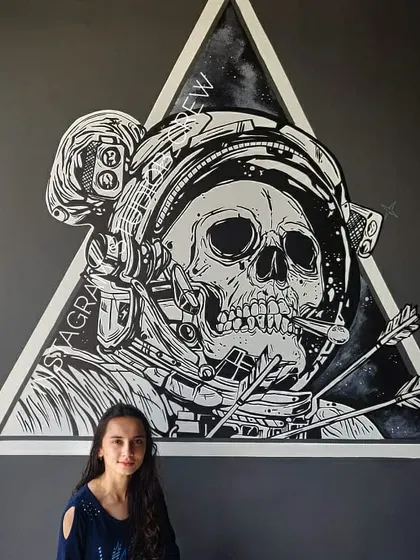 This black and white astronaut skull was a super fun piece for the Lounge29 pub in Mysore. It's a high-impact, edgy design that gives the space a unique, graphic novel feel.