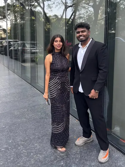 Another shot from the event, this time with a friend in a classic black suit. It shows how I can coordinate looks for couples or groups.