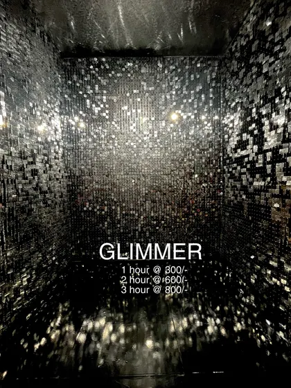 Here's a closer look at the 'Glimmer' Reel Booth in Jayanagar. This space is available for hourly rental, giving you an instant, high-impact set for your next video shoot.