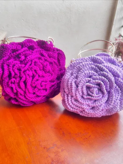 Two beautiful Rose Bags in shades of purple. Each one is handcrafted with care and attention to detail.