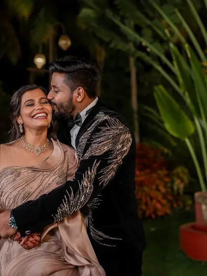 A stylish reception look. We love capturing the glamour and fun of the evening party, from the designer outfits to the happy, candid interactions.