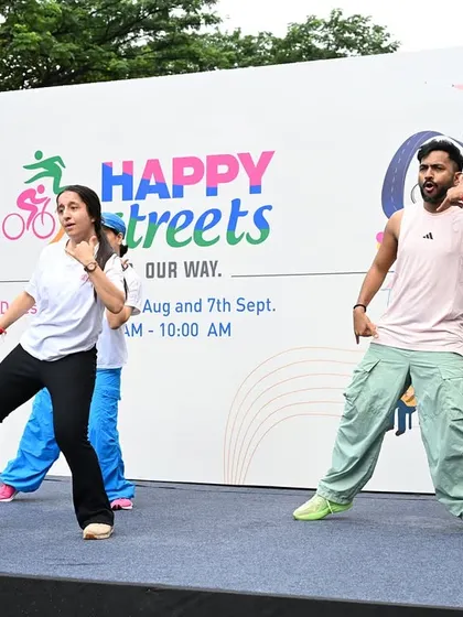 Teaching some Bollywood moves on stage during the Happy Streets event. My choreography for public events is always simple, energetic, and easy for the crowd to follow along.