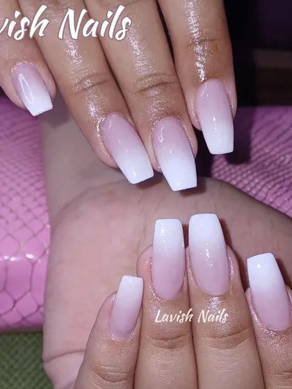 A perfect baby boomer or ombré nail set on coffin-shaped nails, with a seamless blend from a natural pink base to a soft white tip.