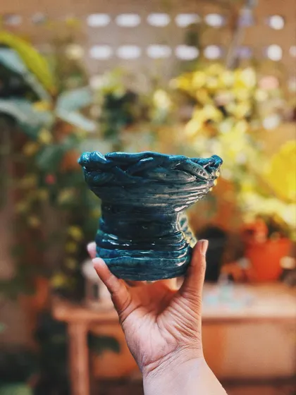 This student came in as a beginner, but her pieces look anything but. Her curious nature made her try things without overthinking, resulting in this bold and dramatic dragon jar and other wonderfully experimental pieces.