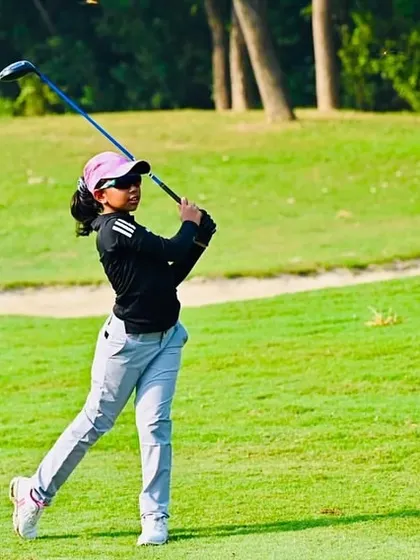 Aahana Shrivastava in mid-swing during the US Kids New Delhi Fall Local Tour, where she secured 1st position with an impressive score of 2-under-par.