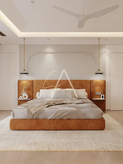 A frontal view of the tan bed, showcasing the custom headboard with integrated, arch-shaped lighting. This detail adds a soft, architectural element to the room while providing ambient light.