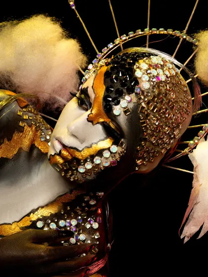 A fantasy portrait created by one of my talented students. The look is inspired by a butterfly, using textured elements, gold leaf, and dramatic lighting to create a magical effect.