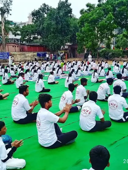 Our players engaged in a breathing exercise during the Yoga Day program. Pranayama is essential for improving lung capacity and mental calm.